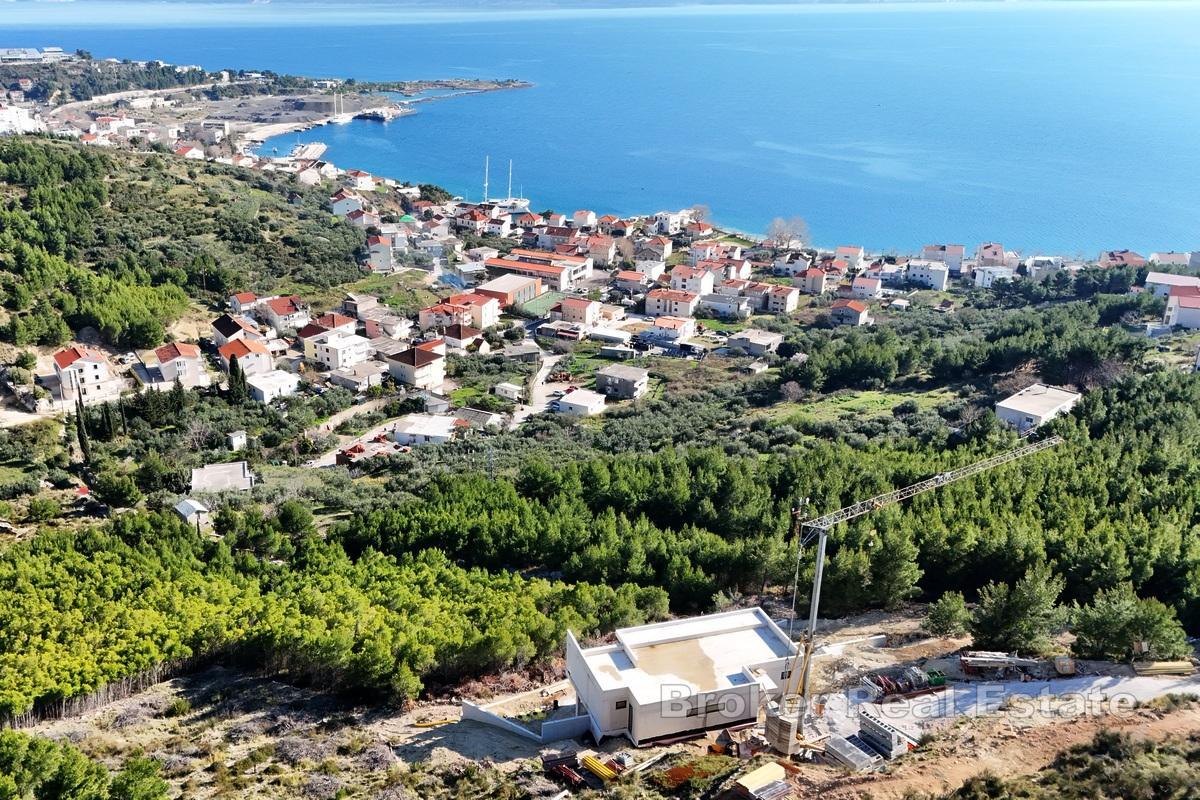 Terreno edificabile con progetto concettuale e vista mare