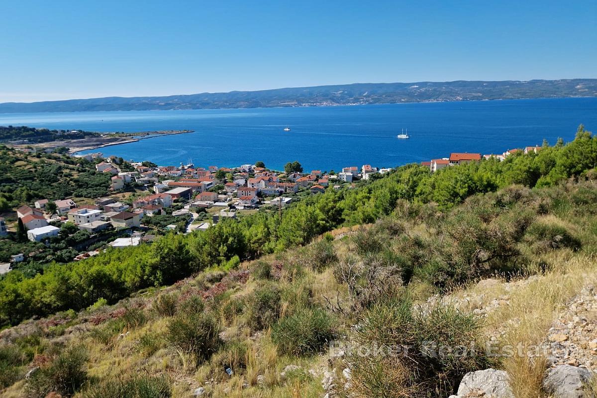 Terreno edificabile con progetto concettuale e vista mare