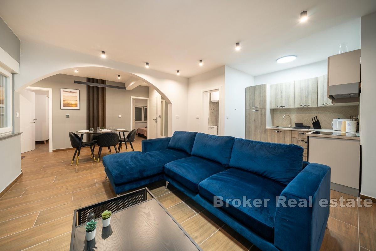 Modern villa med sex lägenheter
