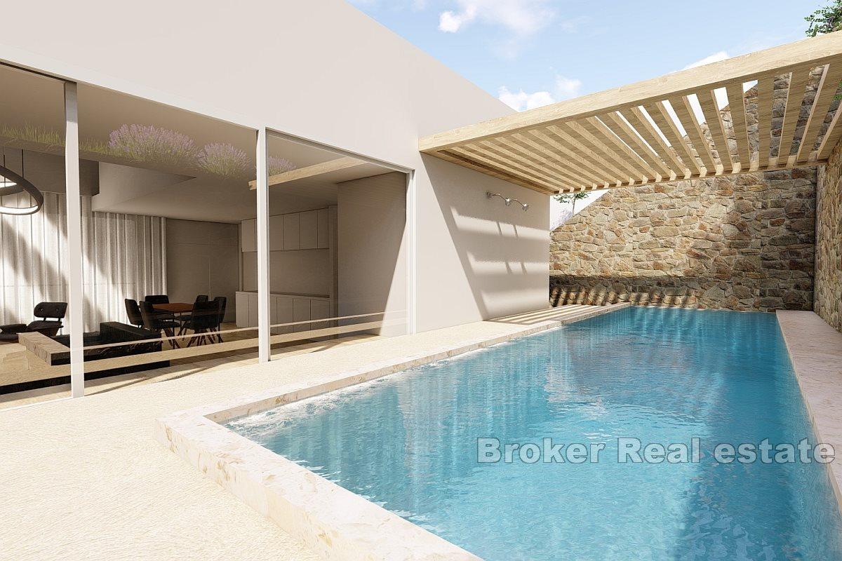 Unfinished house in front row by the sea