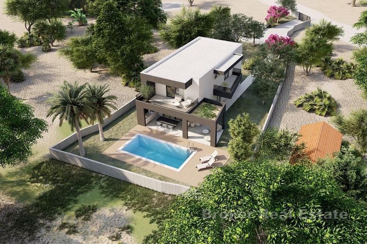 Tomt med byggetillatelse nær sjøen