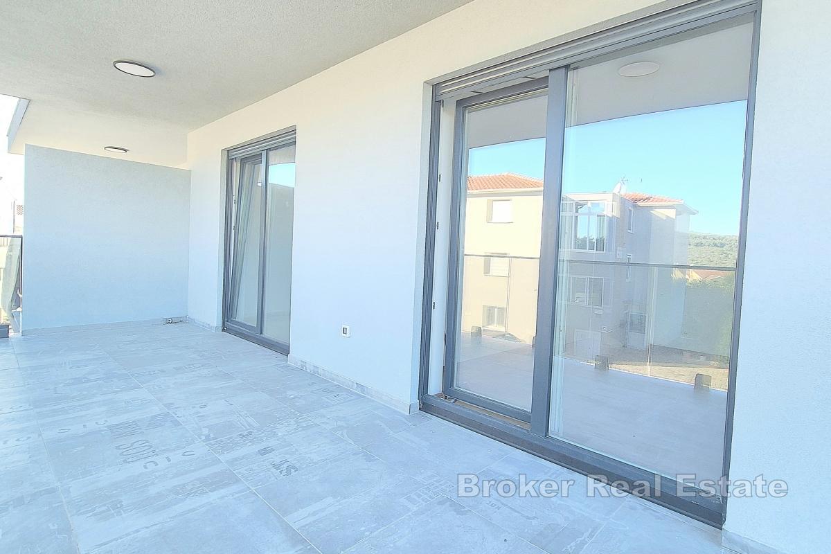 Appartement dans un immeuble neuf avec parking