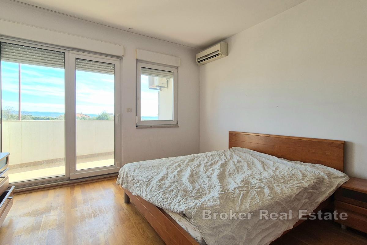 Appartamento con tre camere da letto e garage