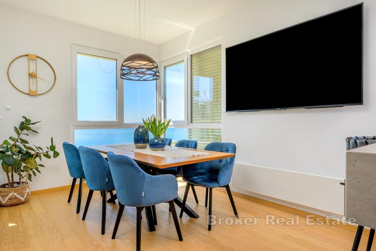 Appartement moderne de trois chambres avec garage et parking