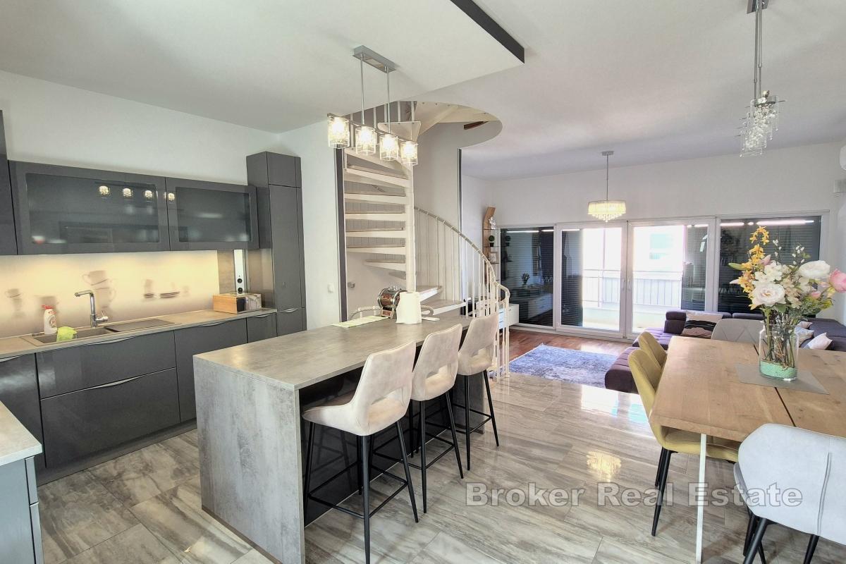 Appartamento con tre camere da letto e garage