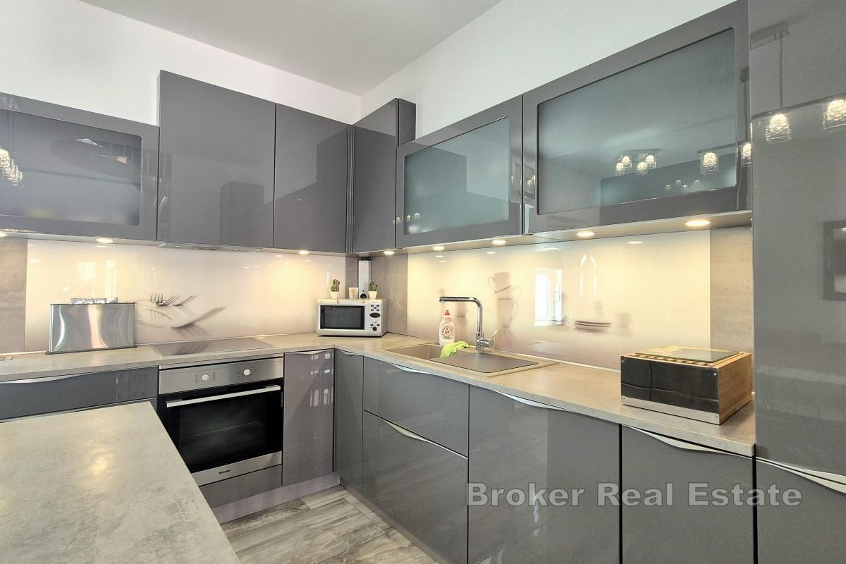 Appartamento con tre camere da letto e garage