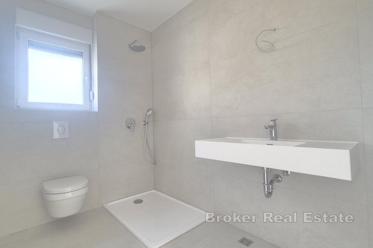 Appartement deux chambres dans un immeuble neuf avec jardin et parking