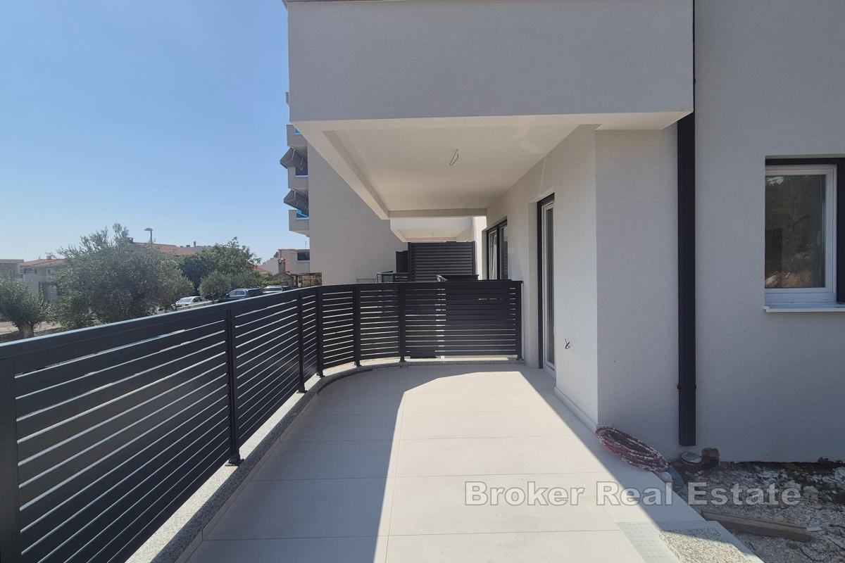 Appartement deux chambres dans un immeuble neuf avec jardin et parking