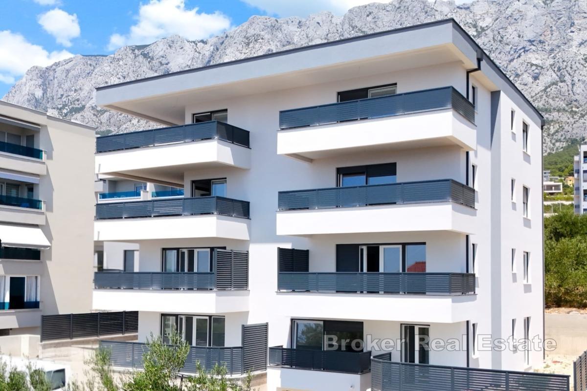 Zwei-Zimmer-Wohnung in einem Neubau mit Garten und Parkplatz