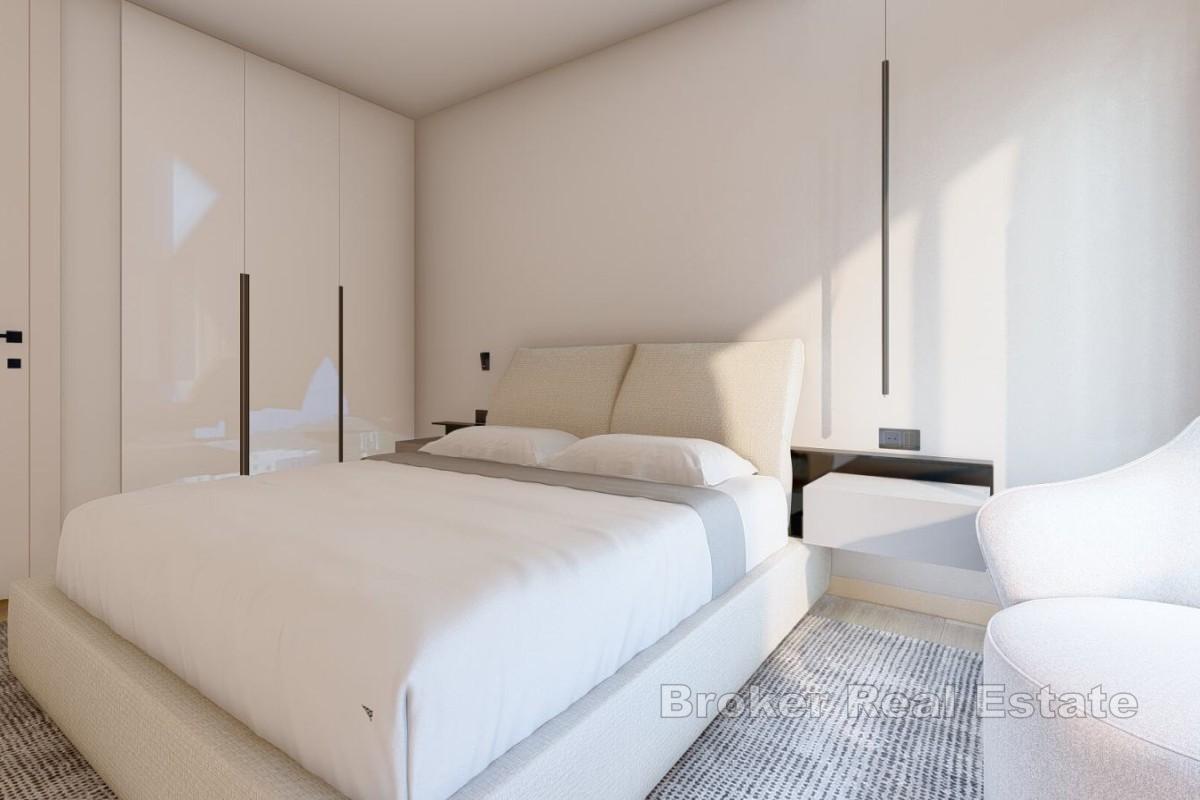 Moderno appartamento con tre camere da letto in un edificio di nuova costruzione con vista mare