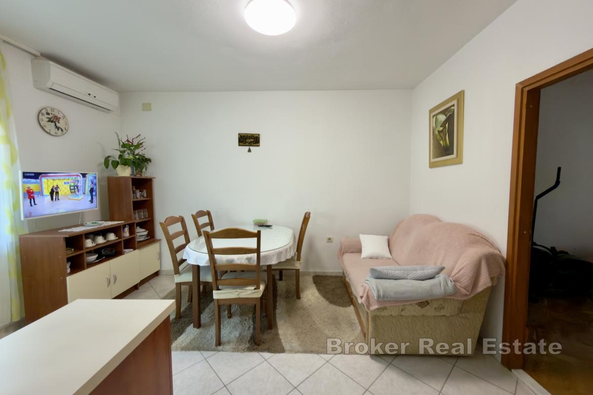 Maison familiale avec parking et jardin