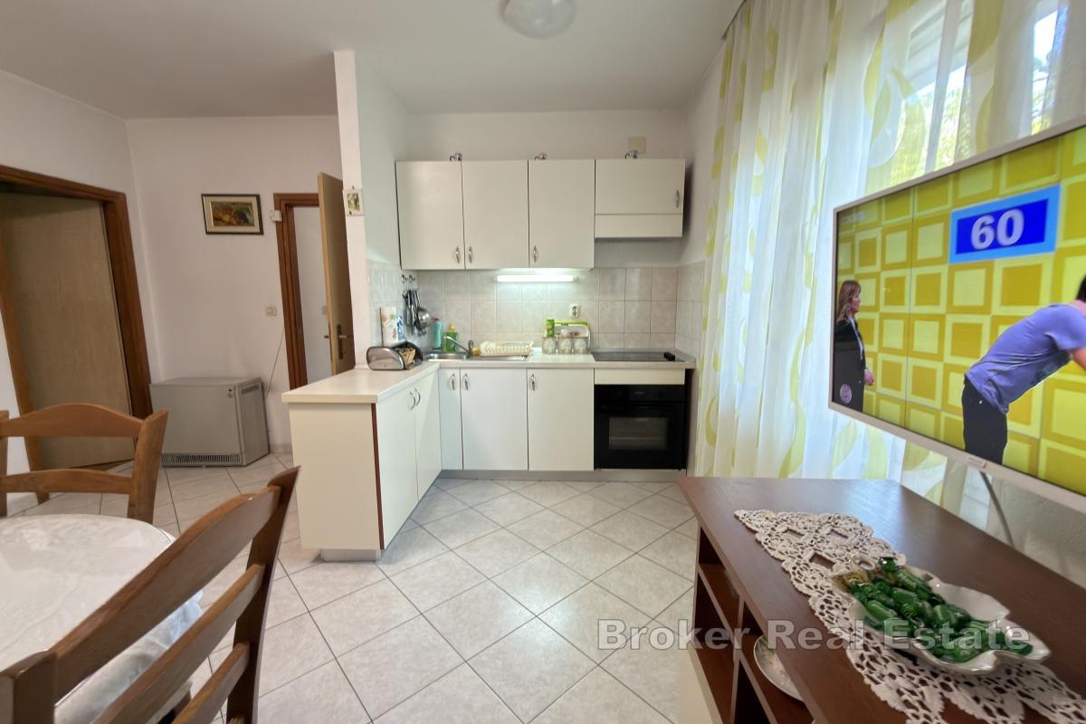 Maison familiale avec parking et jardin