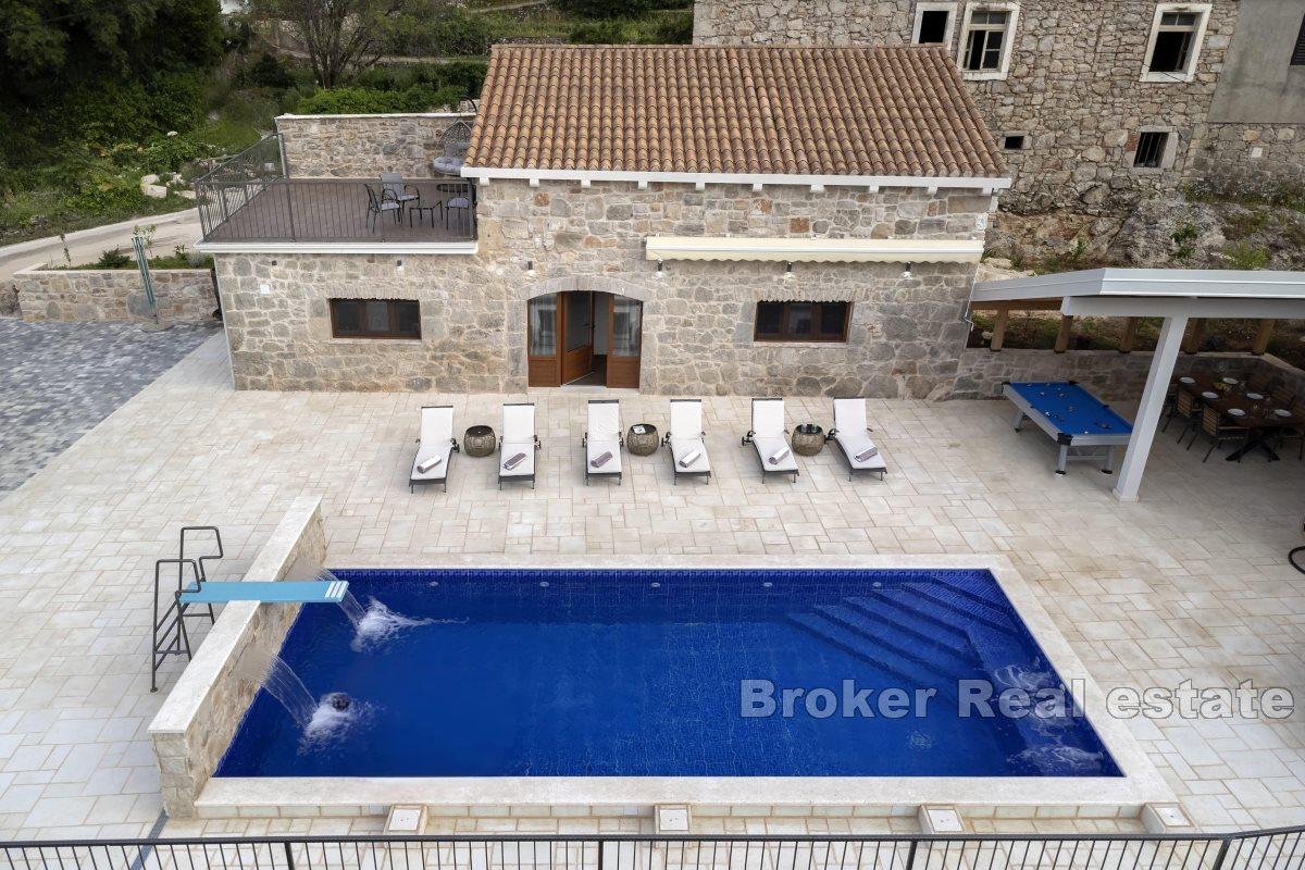 Stone house with a swimming pool