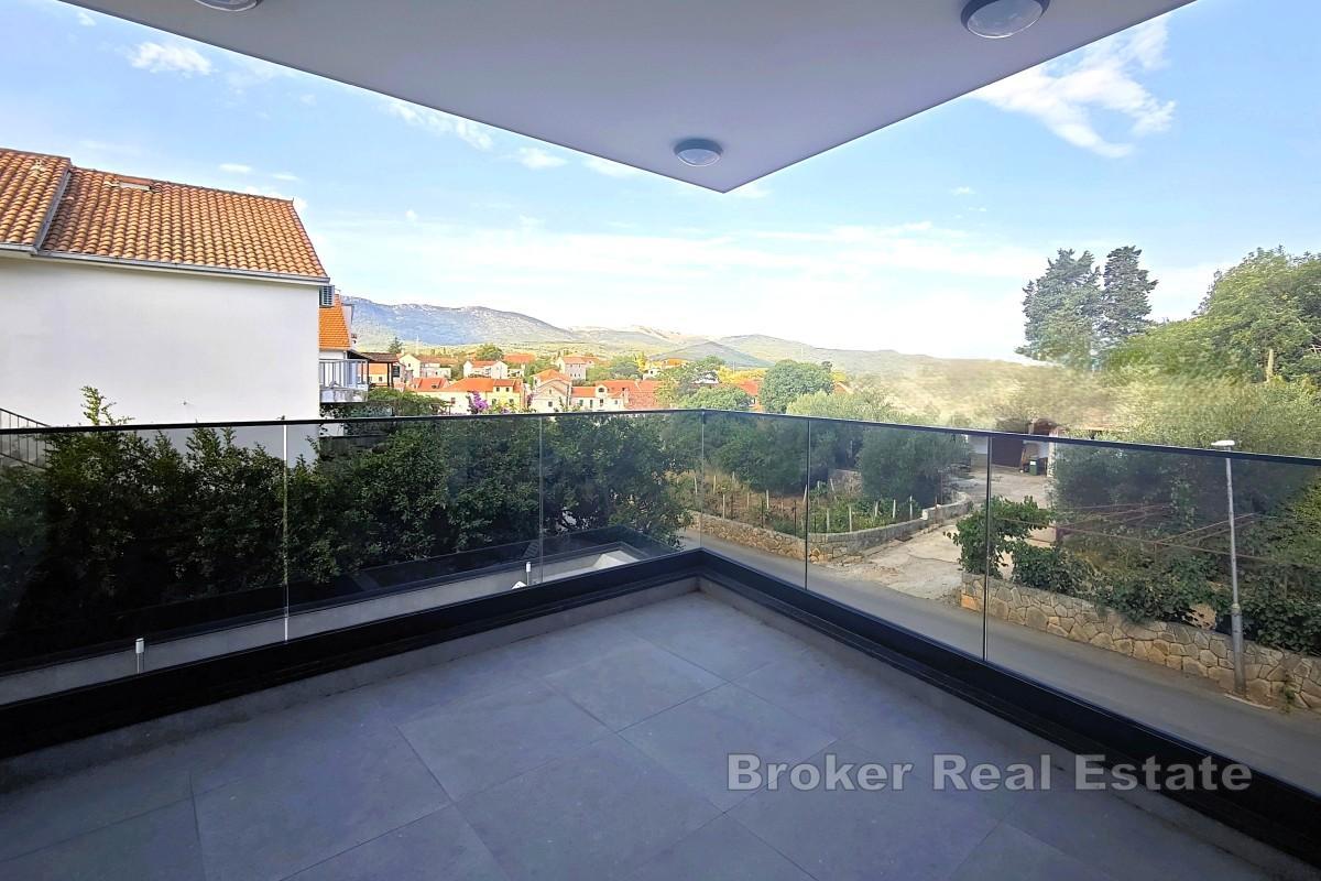 Novostavba - apartmán v centru města s parkováním, blízko moře