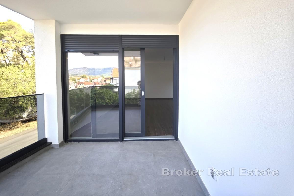 Novostavba - apartmán v centru města s parkováním, blízko moře