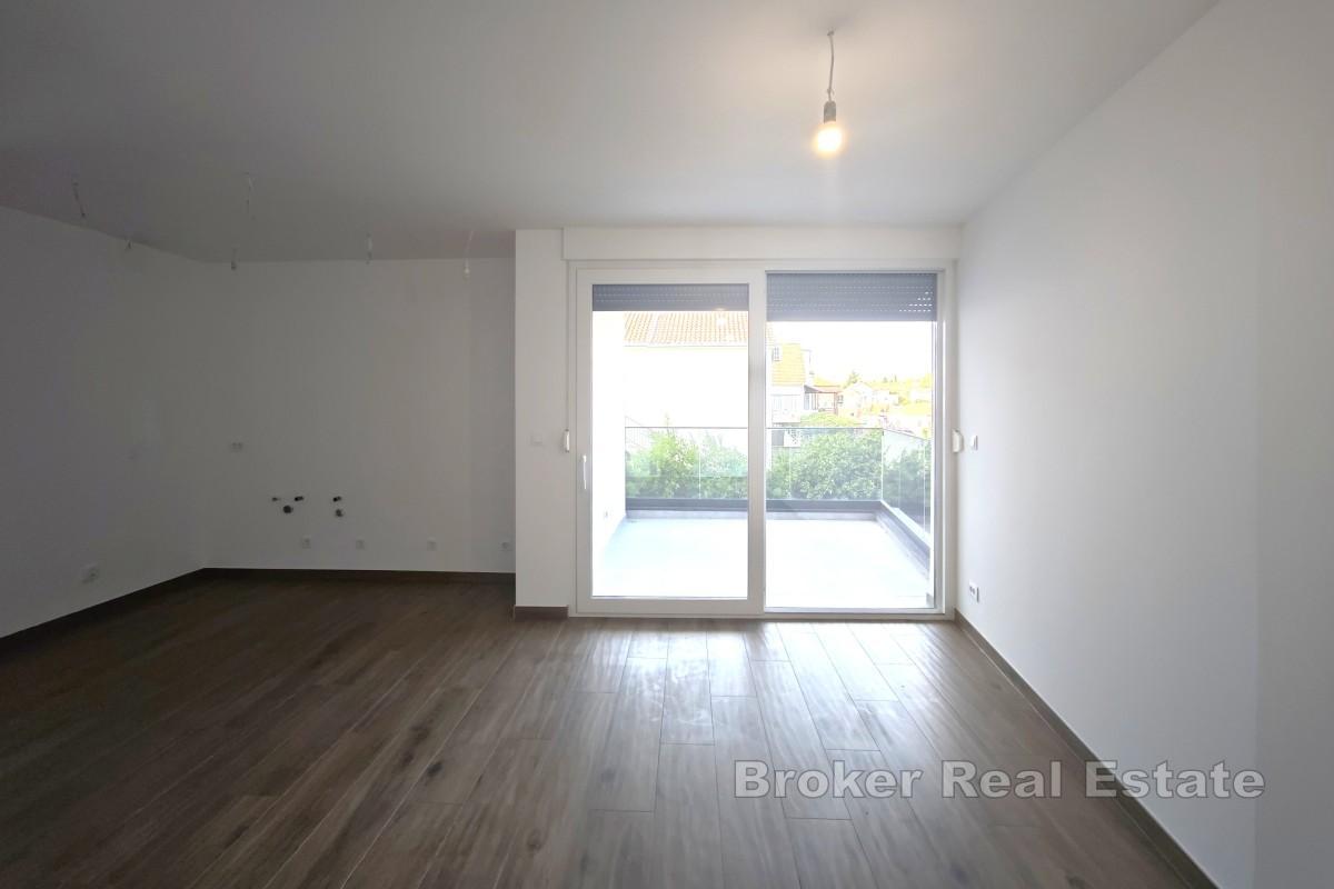 Novostavba - apartmán v centru města s parkováním, blízko moře