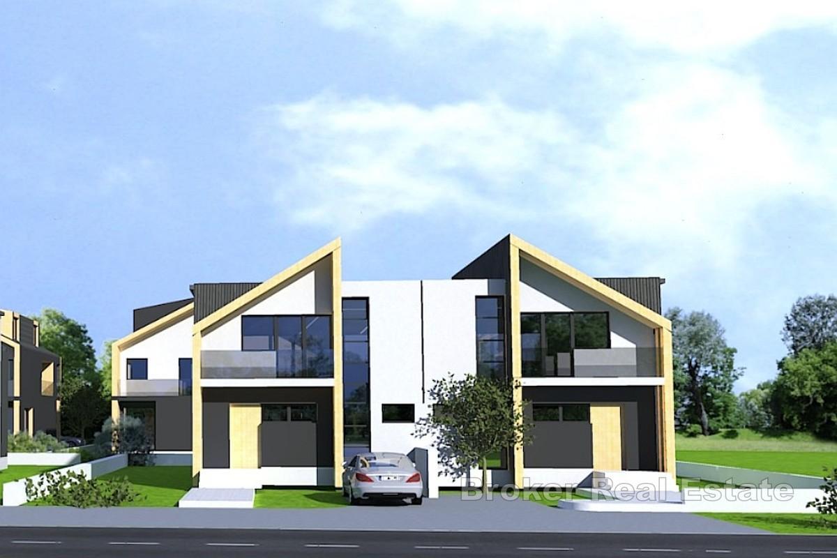 Novostavba - dvojdomek se zahradou o rozloze 150 m2 a dvěma parkovacími místy