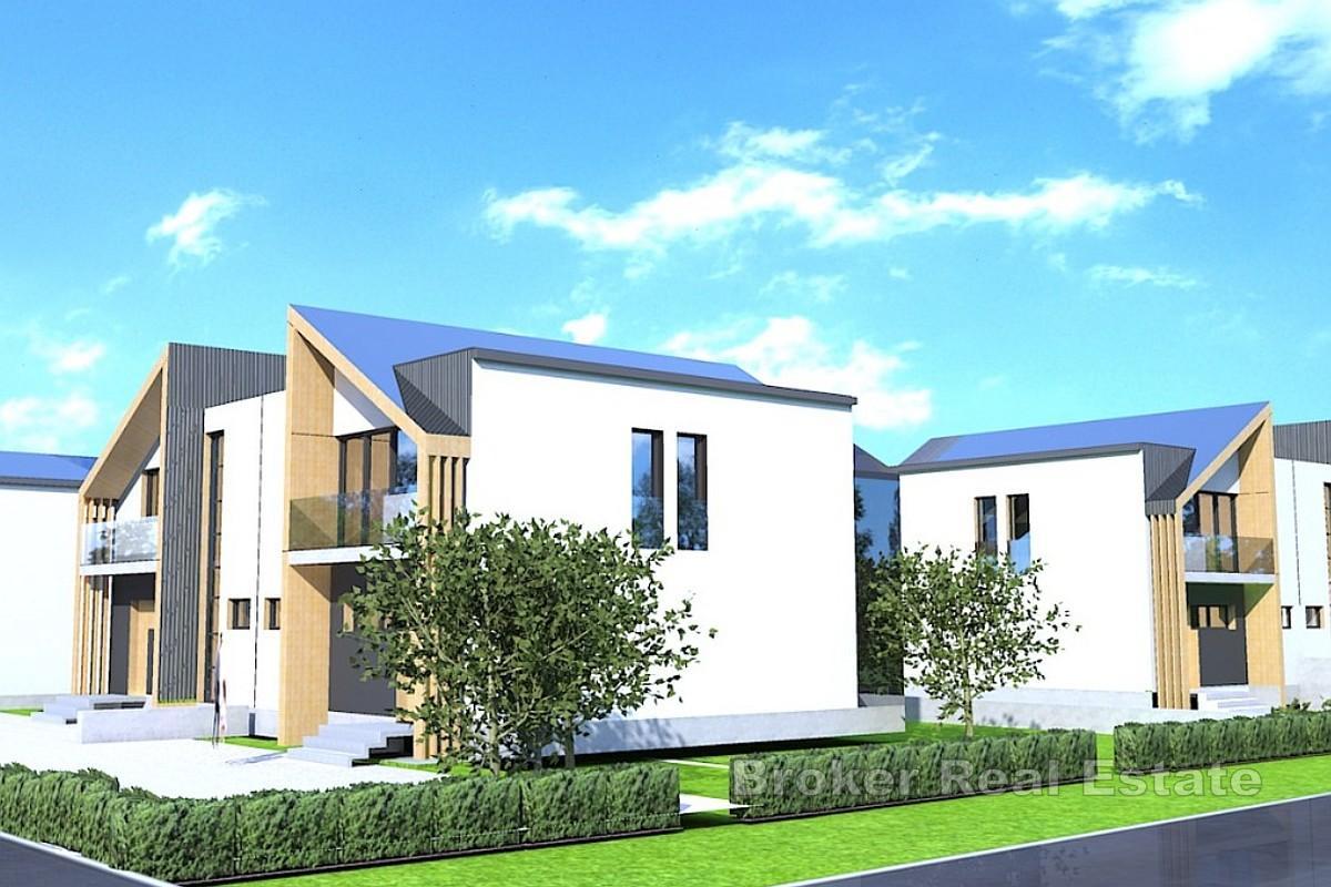 Novostavba - dvojdomek se zahradou o rozloze 150 m2 a dvěma parkovacími místy