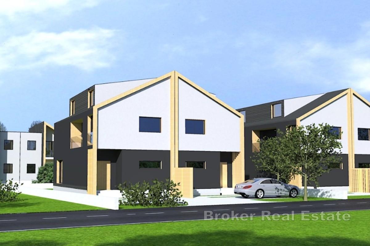 Nuova costruzione - casa bifamiliare con giardino di 150 m² e due posti auto