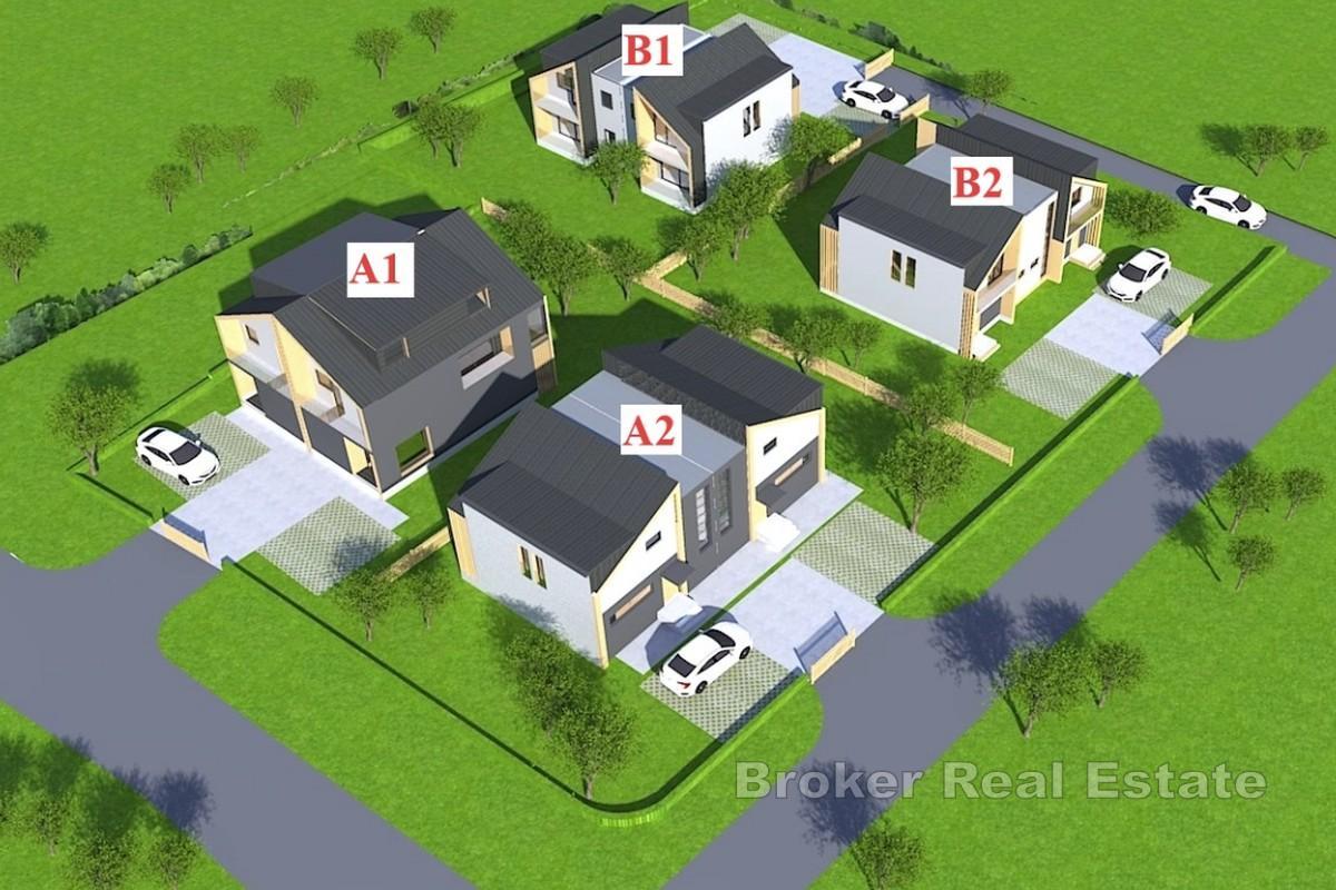 Novostavba - dvojdomek se zahradou o rozloze 150 m2 a dvěma parkovacími místy