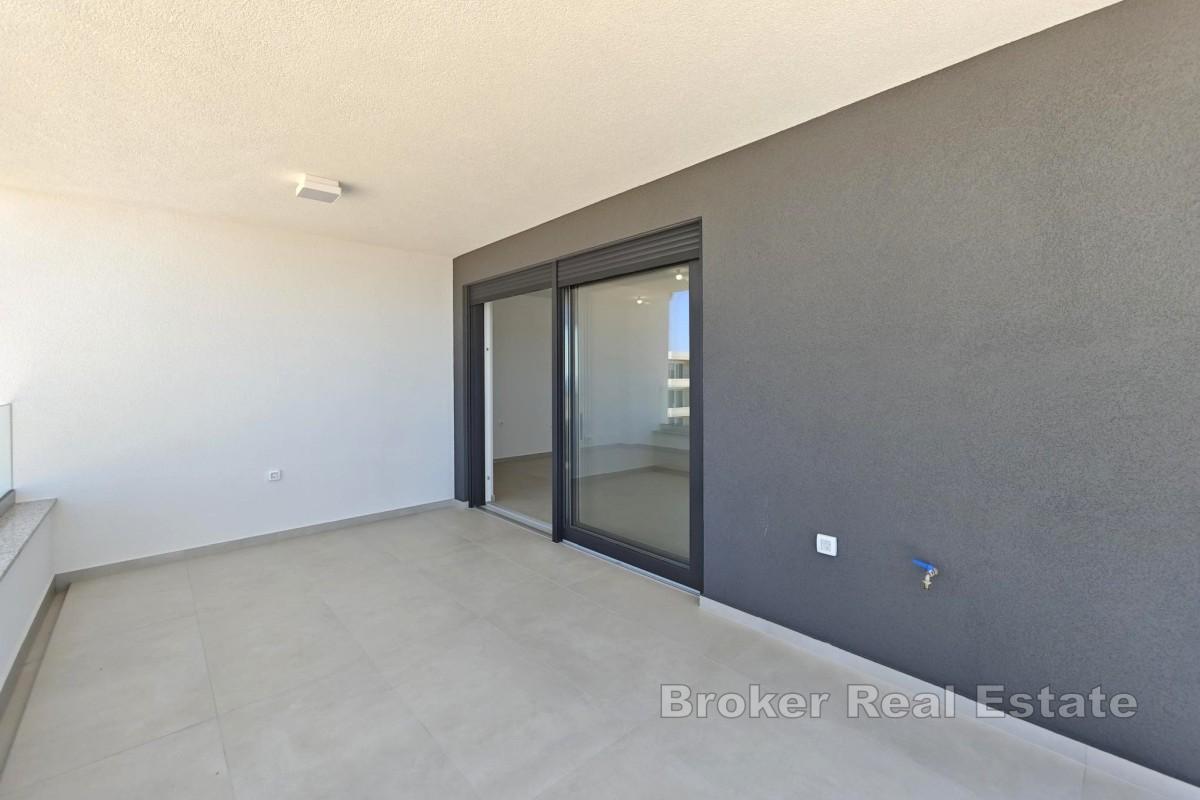 Neubau – Wohnung mit Terrasse und zwei Parkplätzen