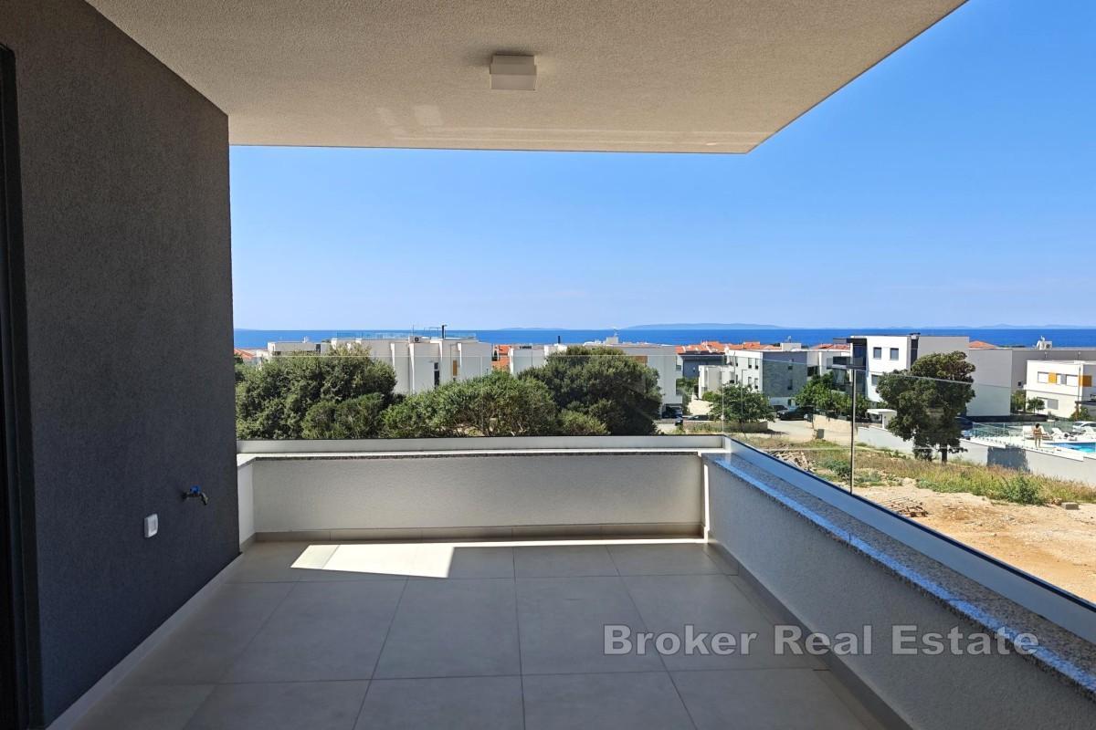 Новое здание - квартира с террасой и двумя парковочными местами