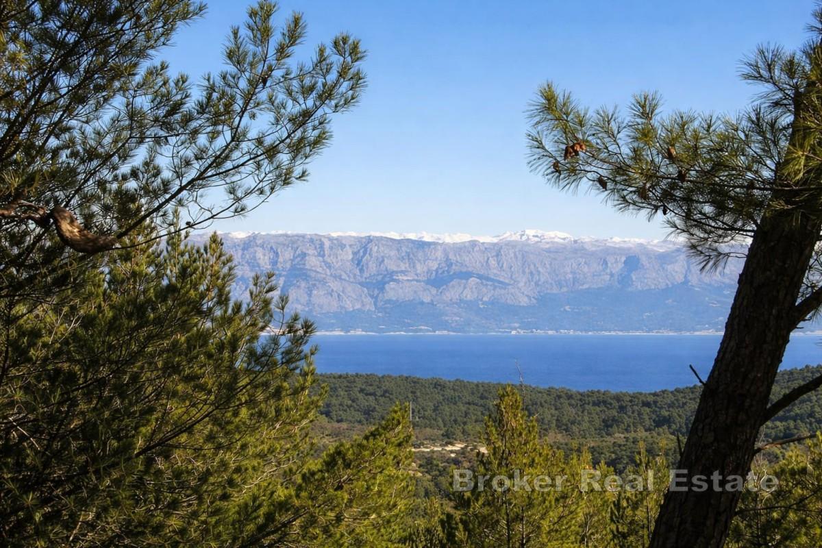 Привлекательный земельный участок под застройку с проектом