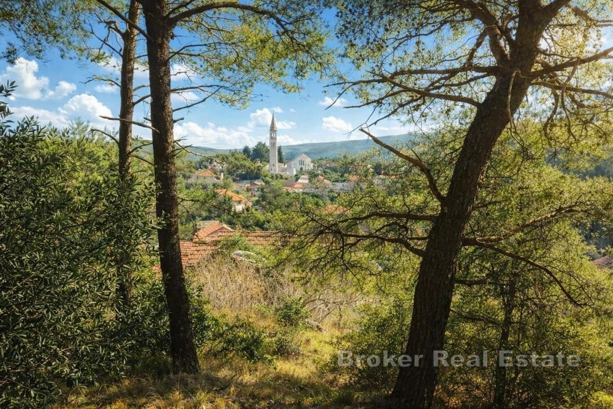 Привлекательный земельный участок под застройку с проектом