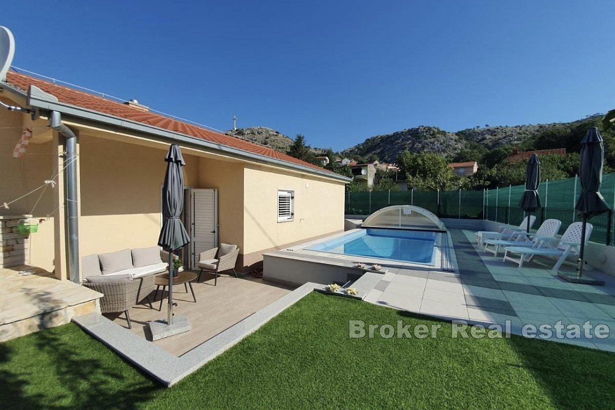 Modern single-story house with a pool