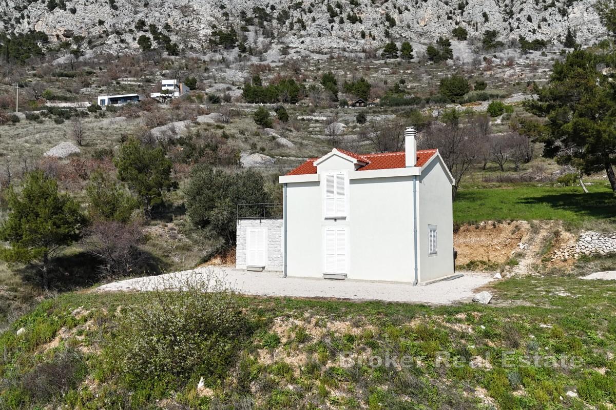 Tomt og hus med utsikt