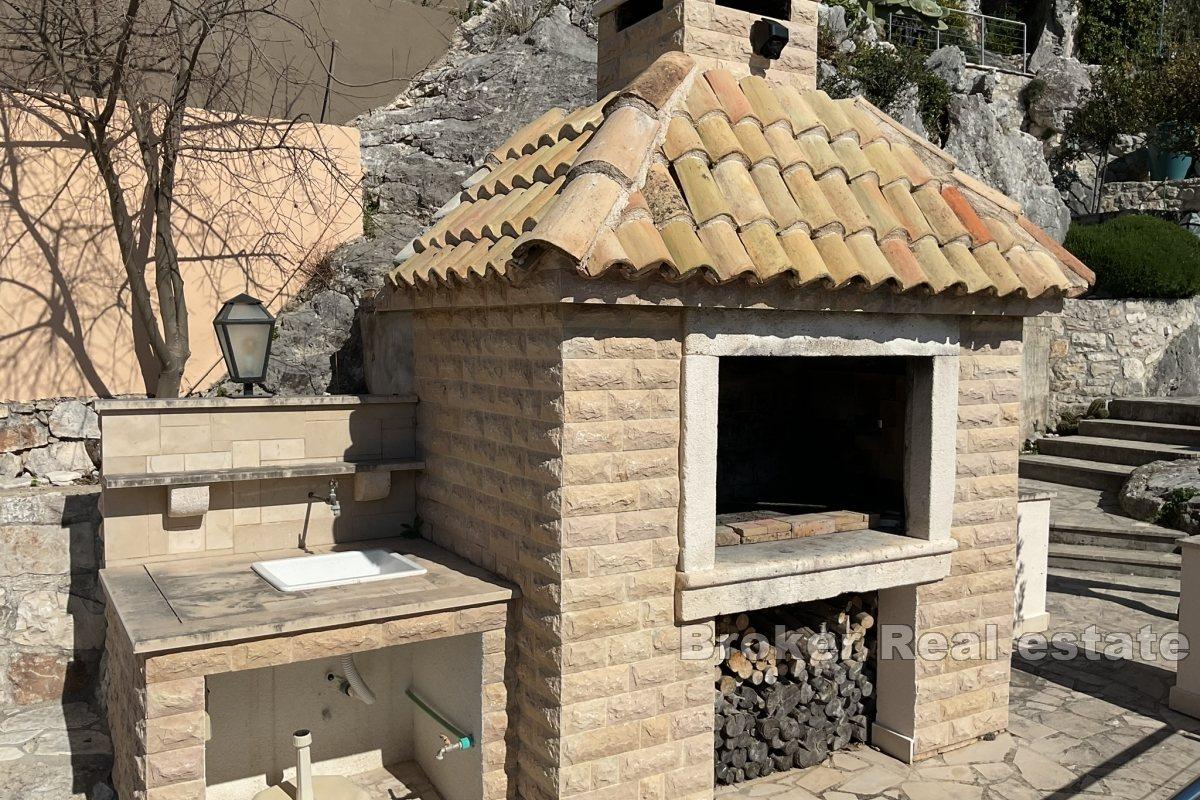 Casa bifamiliare in pietra con vista panoramica sul mare