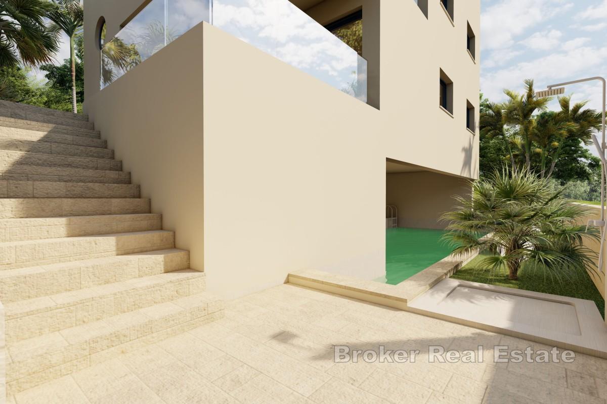 Terrain constructible avec projet et permis de construire