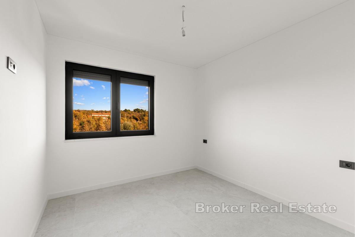 Penthouse s panoramatickým výhledem a střešní terasou