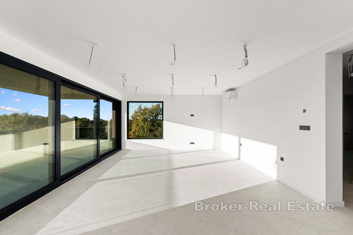 Takvåning med panoramautsikt och takterrass