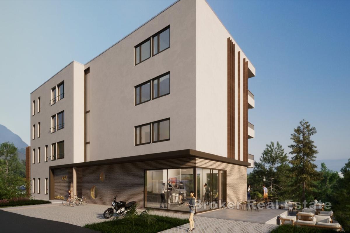 Appartement T4 avec balcon dans un immeuble neuf et moderne