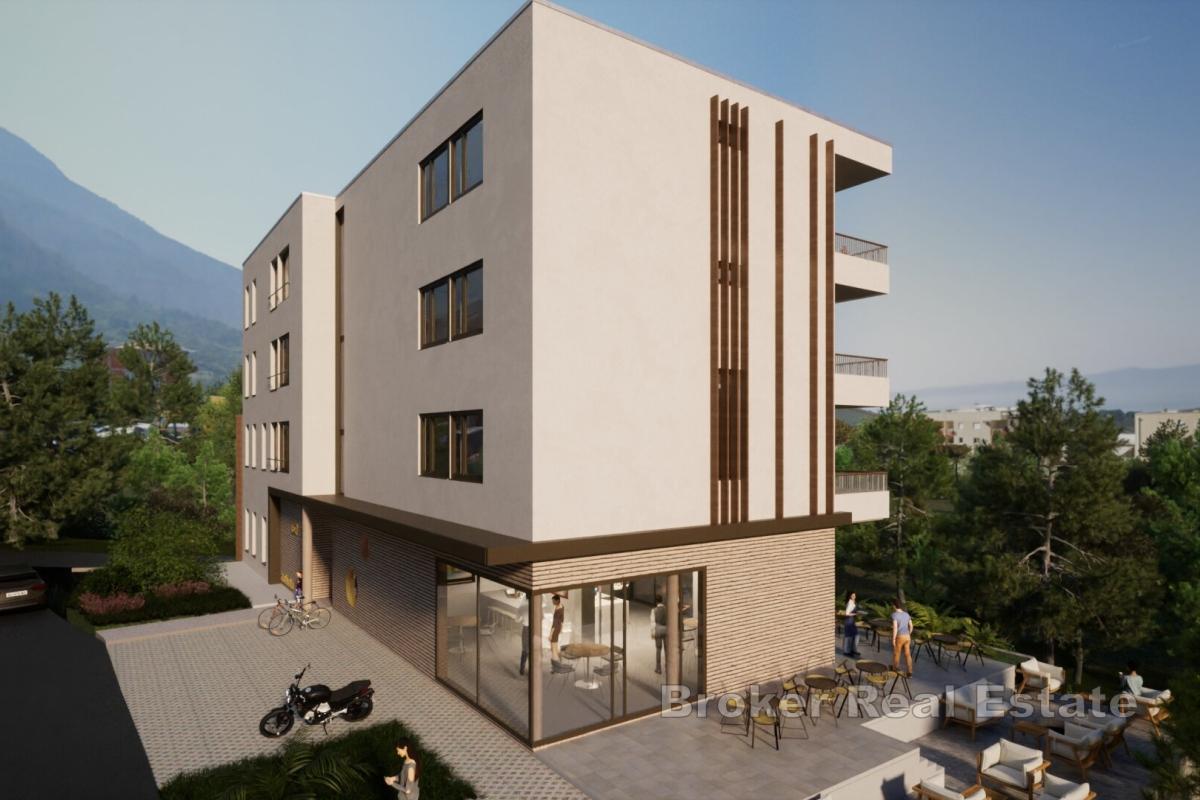 Appartement T4 avec balcon dans un immeuble neuf et moderne