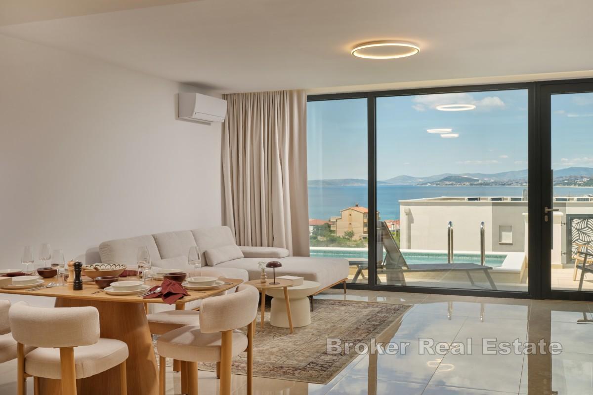 Exklusive Dreizimmerwohnung in einer Luxusvilla mit Pool