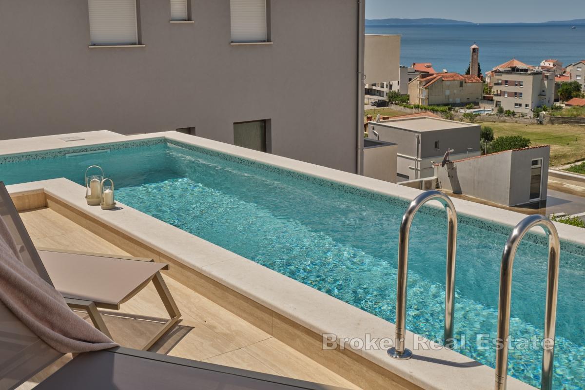 Esclusivo appartamento su tre livelli con piscina privata in affitto a lungo termine
