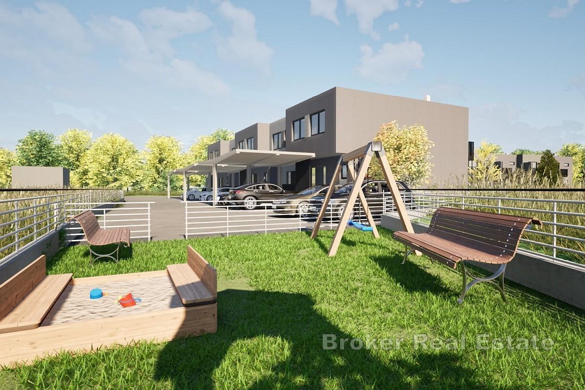 Moderna casa unifamiliare con giardino e terrazza privati