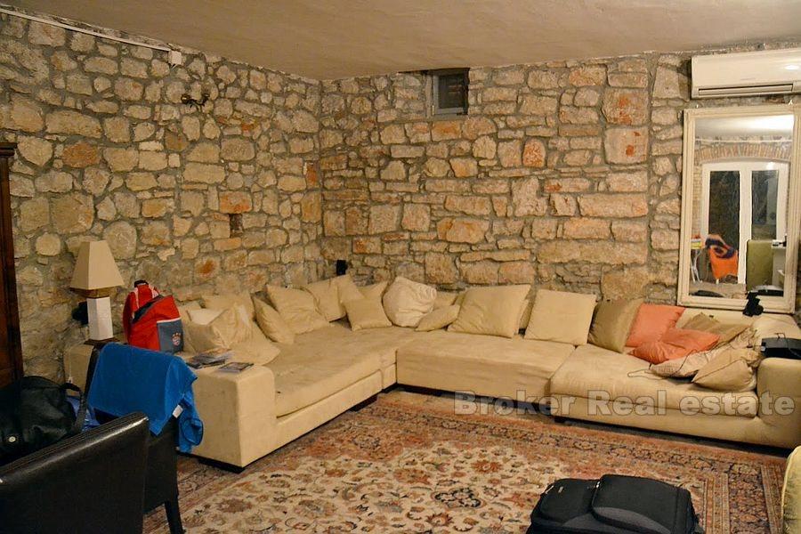 Seafront stone house on island near Sibenik, for sale