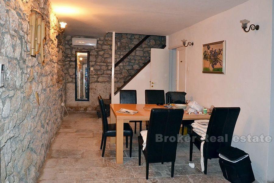 Seafront stone house on island near Sibenik, for sale