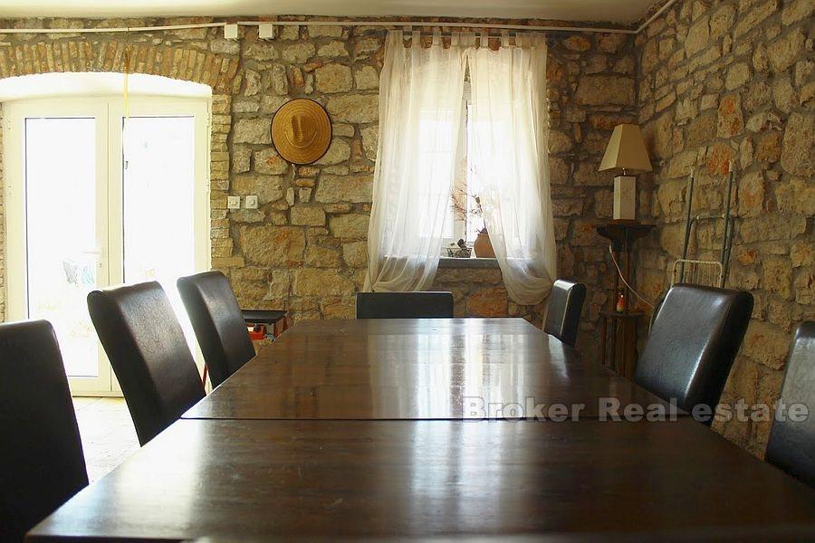 Seafront stone house on island near Sibenik, for sale