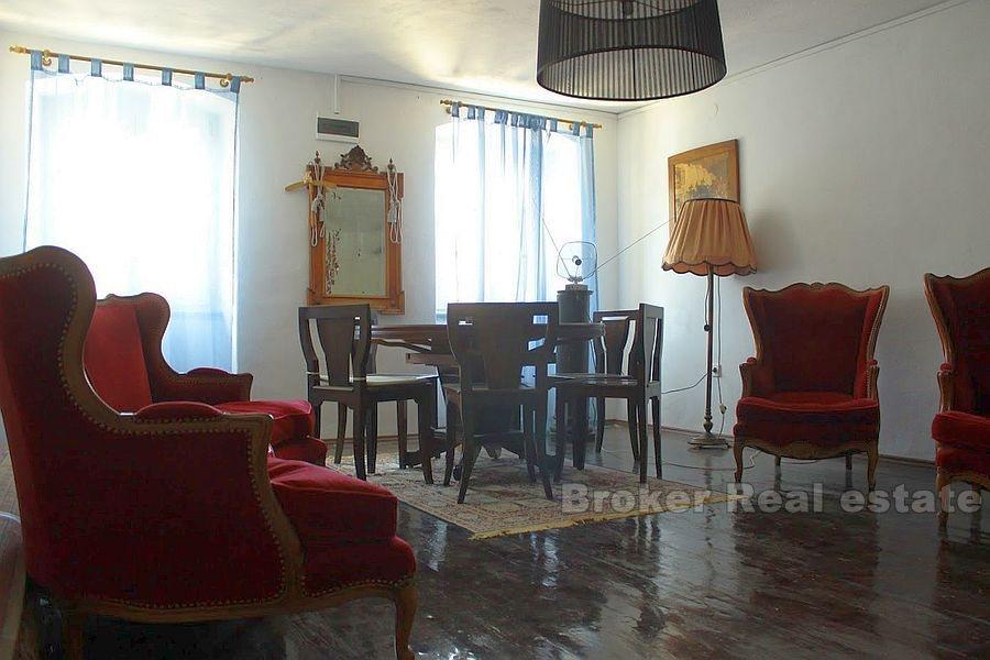 Seafront stone house on island near Sibenik, for sale
