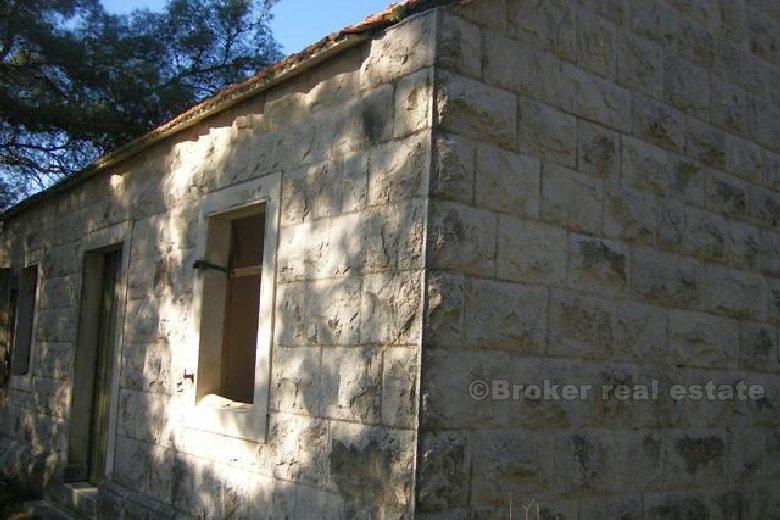 Land plot with two houses, for sale