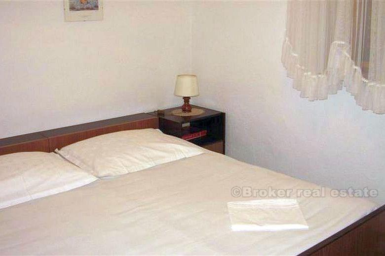 Detached house with three apartments