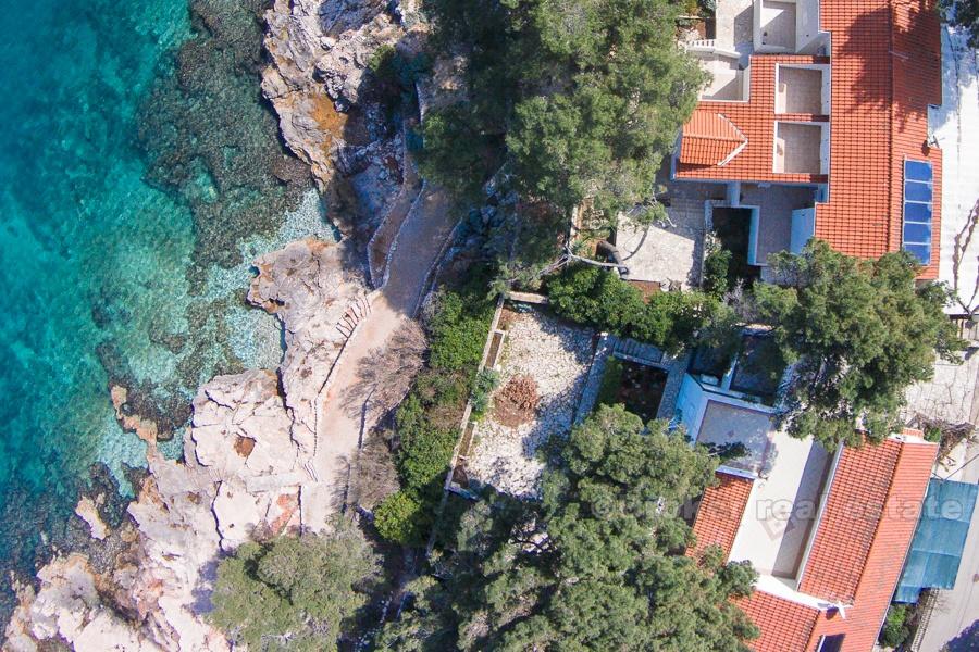 Appartamento con una camera da letto in prima fila al mare