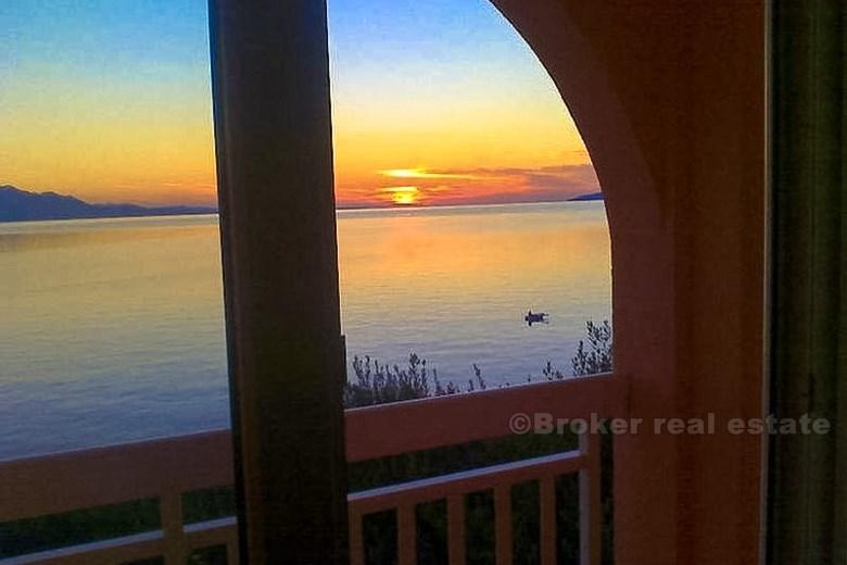 Newly built house at first row to the sea