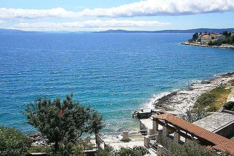 Hus ved stranden, for salg