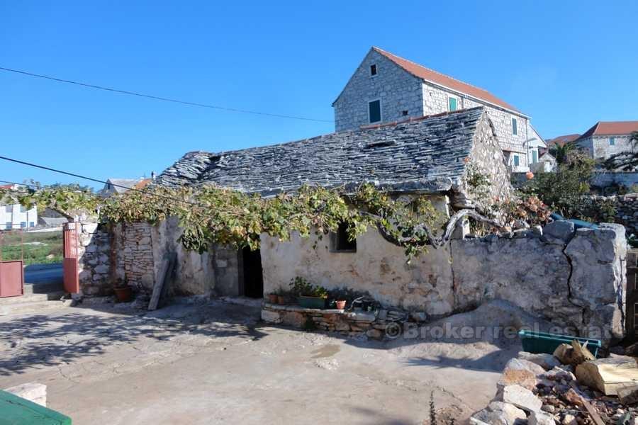 The old stone house with a garden
