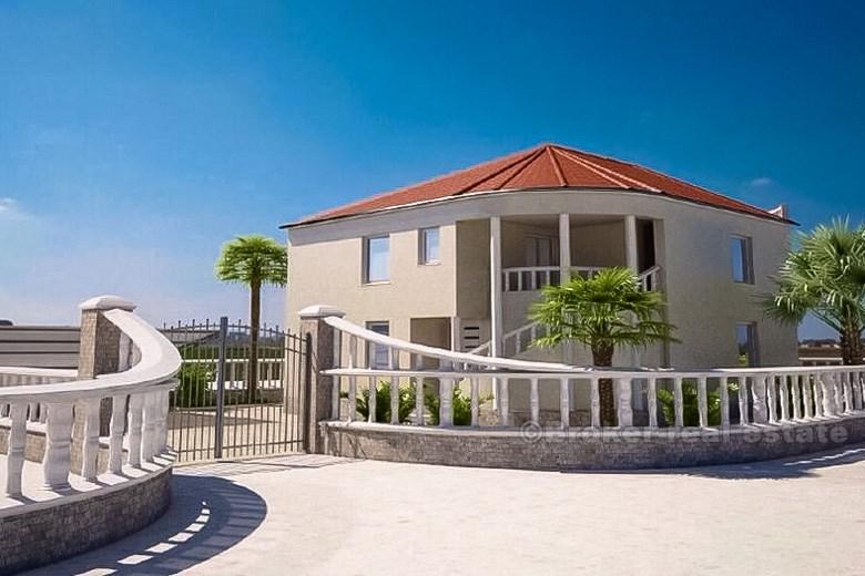 Hus under uppförande, till salu